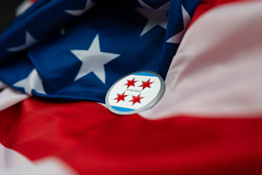 Abbott World Marathon Majors Chicago collectible coin with four red stars displayed on an American flag background