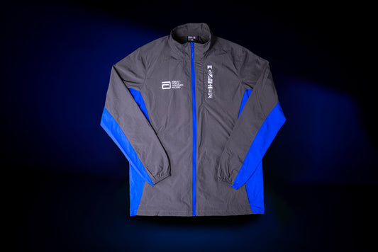 Gray jacket with blue accents on a dark background